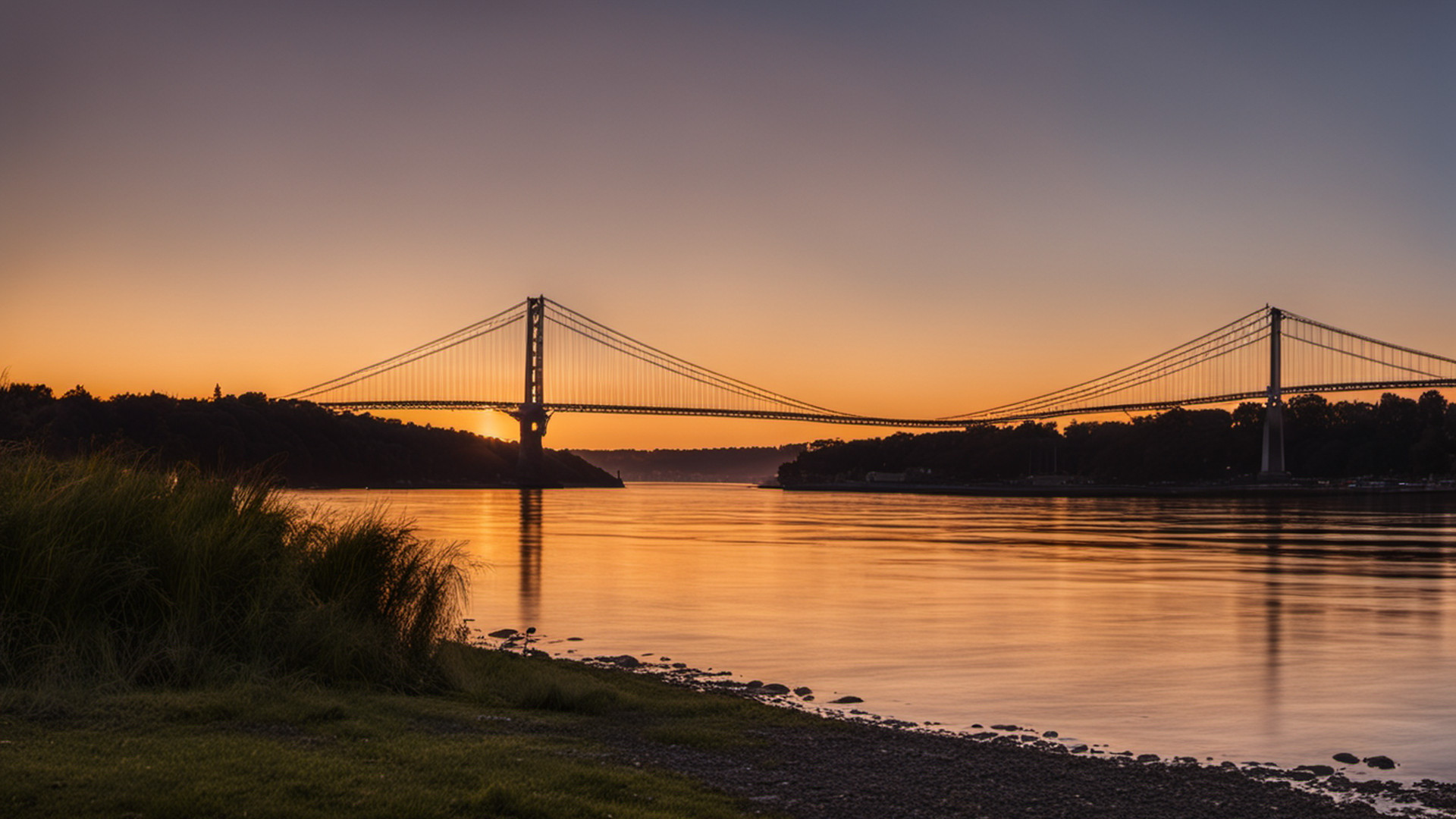 Generated waterfront lawn at sunset with one distant bridge