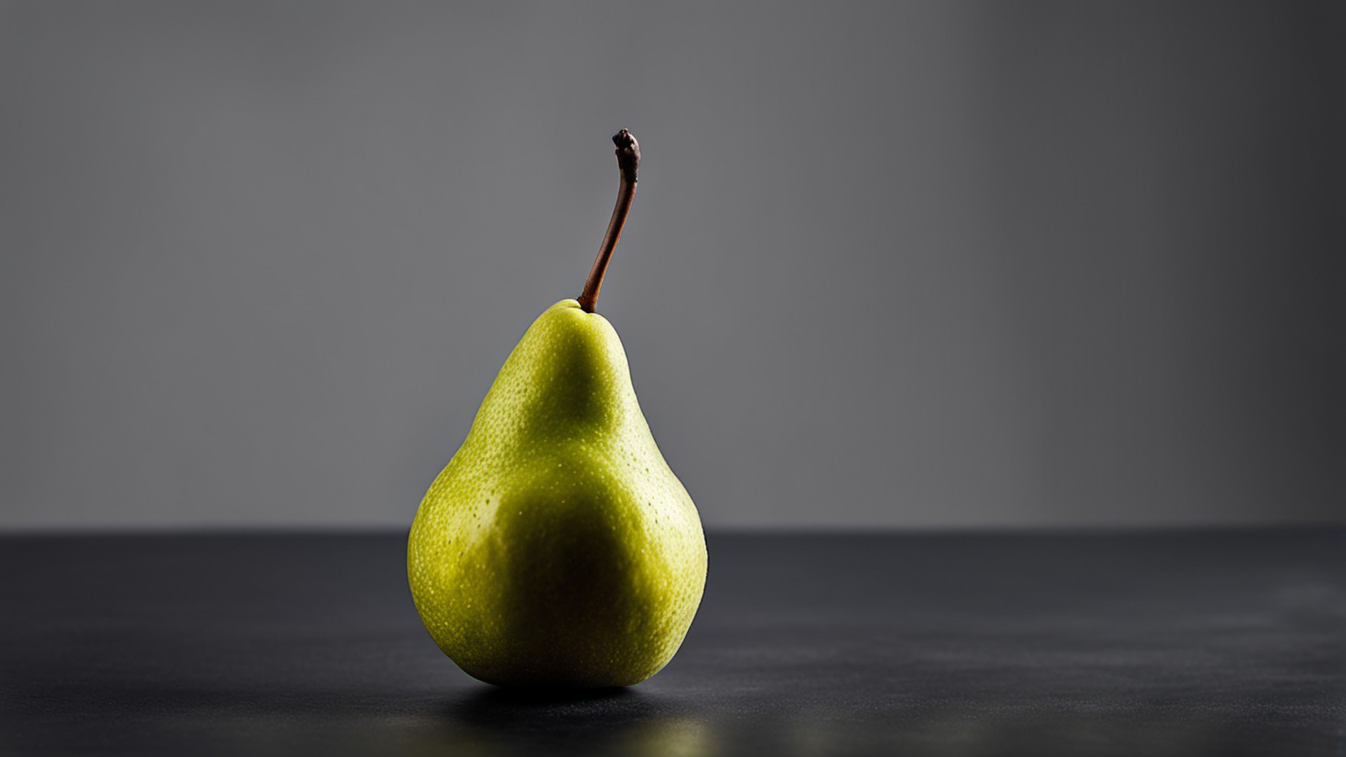 Generated single whole ripe pear on a gray tabletop